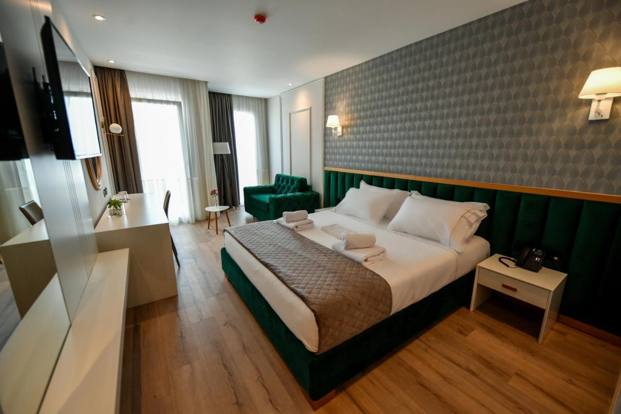 Iliad Hotel دراس المظهر الخارجي الصورة