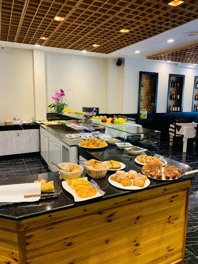 Iliad Hotel دراس المظهر الخارجي الصورة